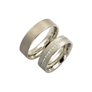 Niessing Trauringe rechteck/bombiert aus 950 Platin mit Brillant, nachhaltiger second hand Schmuck perfekt aufgearbeitet