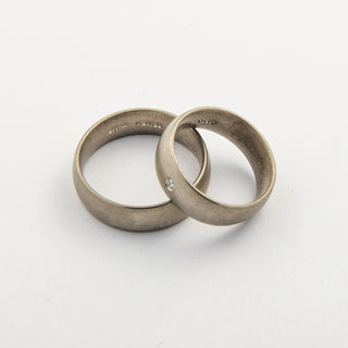 Niessing Trauringe spitzoval/flach aus 750 Graugold mit Brillant, nachhaltiger second hand Schmuck perfekt aufgearbeitet