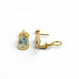 Ohrstecker mit Clipmechanik aus 750 Gelbgold mit Topas und Brillant, nachhaltiger second-hand Schmuck perfekt aufgearbeitet