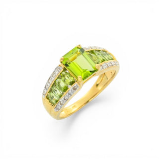 Ring aus 585 Gelb- und Weißgold mit Peridot und Diamant, nachhaltiger second hand Schmuck perfekt aufgearbeitet