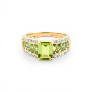 Ring aus 585 Gelb- und Weißgold mit Peridot und Diamant, nachhaltiger second hand Schmuck perfekt aufgearbeitet