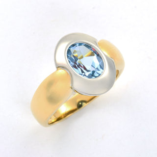 Ring aus 585 Gelb- und Weißgold mit Topas, nachhaltiger second hand Schmuck perfekt aufgearbeitet