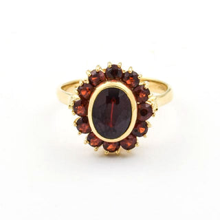 Granatring aus 750 Gelbgold, nachhaltiger second hand Schmuck perfekt aufgearbeitet