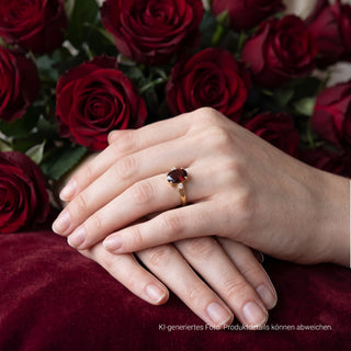 Granatring aus 585 Gelbgold mit Brillant, nachhaltiger second-hand Schmuck perfekt aufgearbeitet