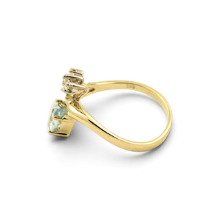 Ring aus 585 Gelb- und Weißgold mit Aquamarin und Brillant, nachhaltiger second-hand Schmuck perfekt aufgearbeitet