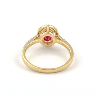 Rubinring aus 585 Gelb- und Weißgold mit Diamant, nachhaltiger second hand Schmuck perfekt aufgearbeitet