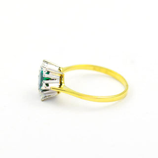 Ring aus 585 Gelb- und Weißgold mit Turmalin und Diamant, nachhaltiger second hand Schmuck perfekt aufgearbeitet