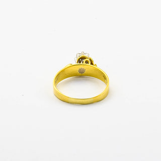 Solitärring aus 750 Gelb- und Weißgold mit Brillant, nachhaltiger second hand Schmuck perfekt aufgearbeitet