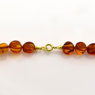 Bernsteinkette im Verlauf mit Schließe aus 585 Gelbgold, nachhaltiger second hand Schmuck perfekt aufgearbeitet