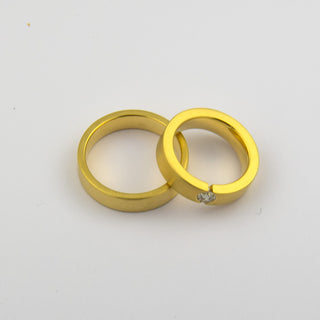 Trauringe aus 585 Gelbgold mit Brillant, nachhaltiger second hand Schmuck perfekt aufgearbeitet