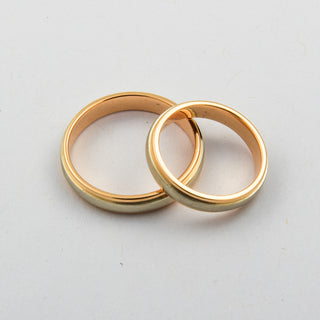 Trauringe aus 585 Rot- und Weißgold, nachhaltiger second hand Schmuck perfekt aufgearbeitet