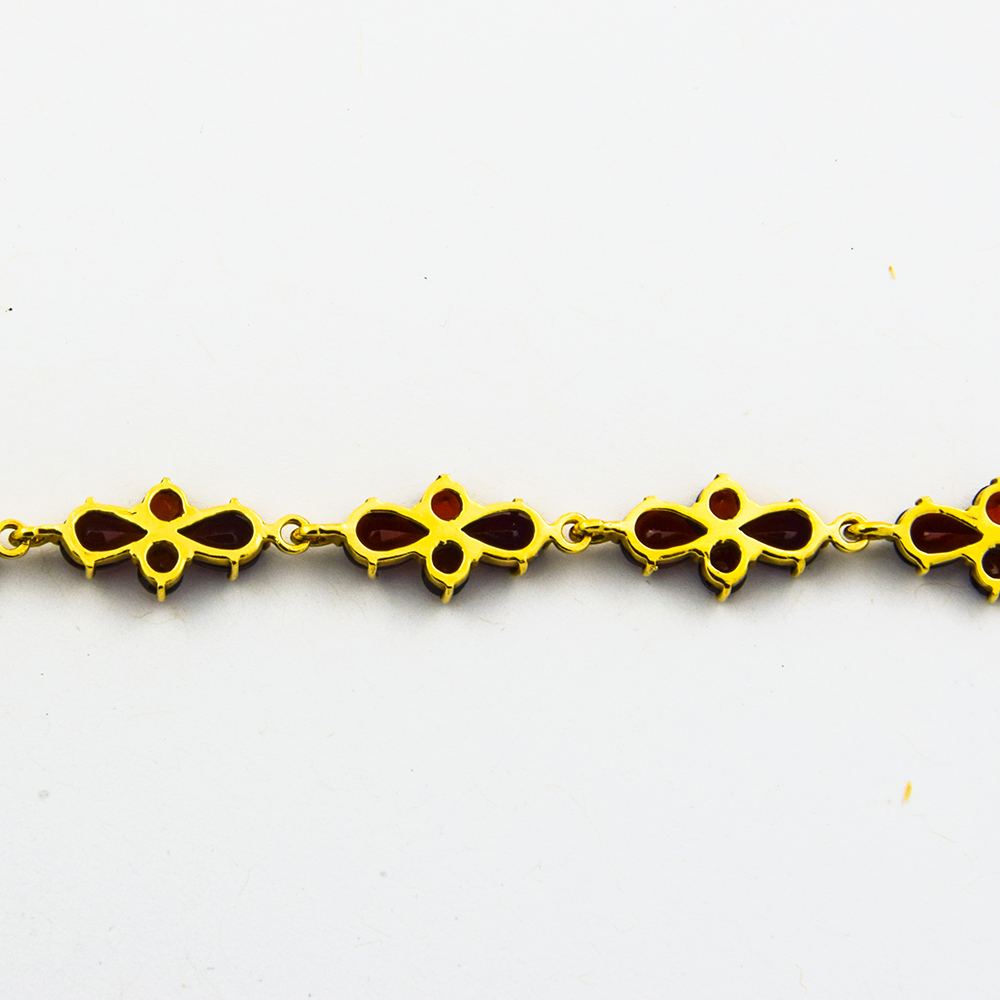 Armband aus 333 Gelbgold mit Granat, nachhaltiger second hand Schmuck perfekt aufgearbeitet