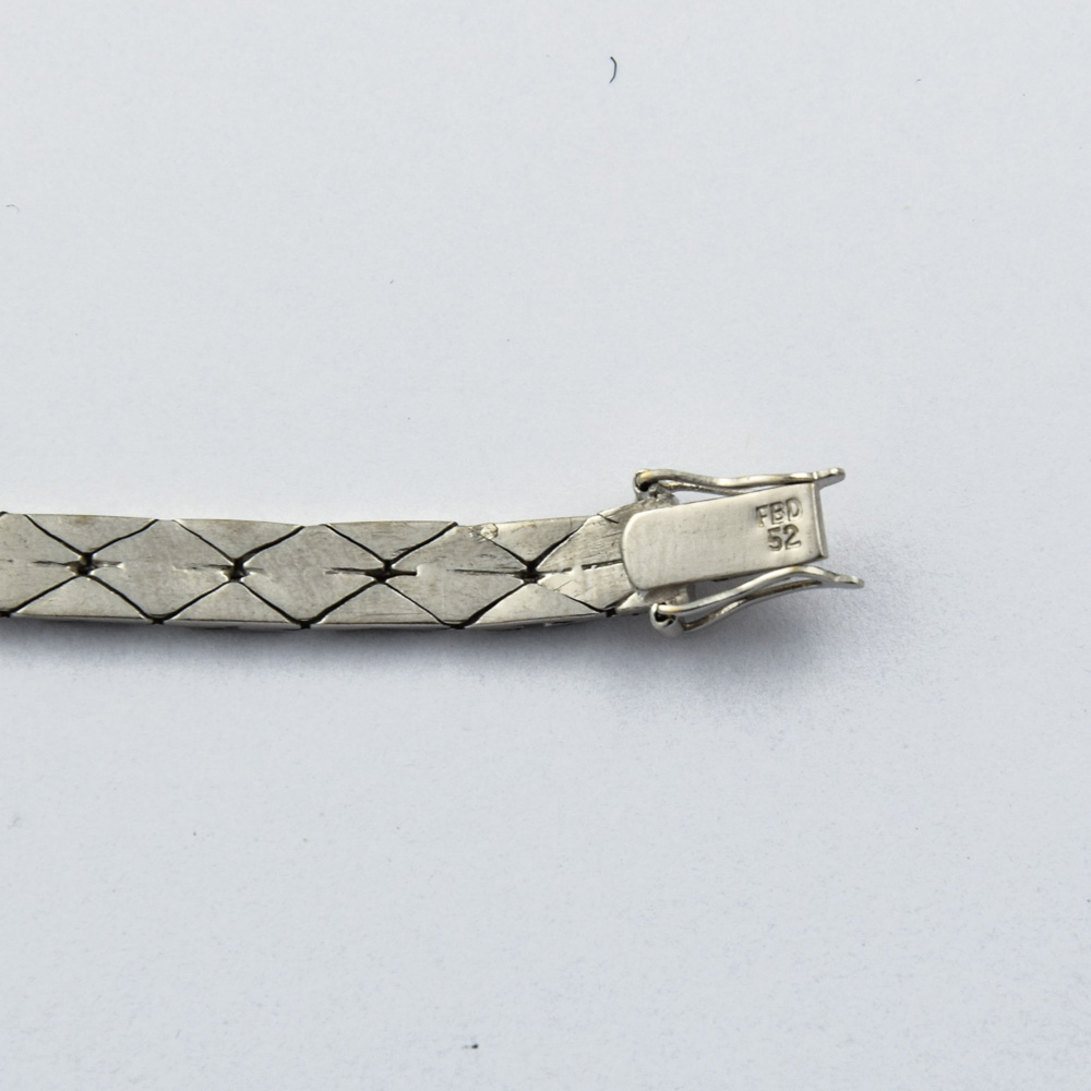 Armband aus 750 Weißgold mit Diamant und Rubin, neuwertig, nachhaltiger second hand Schmuck perfekt aufgearbeitet