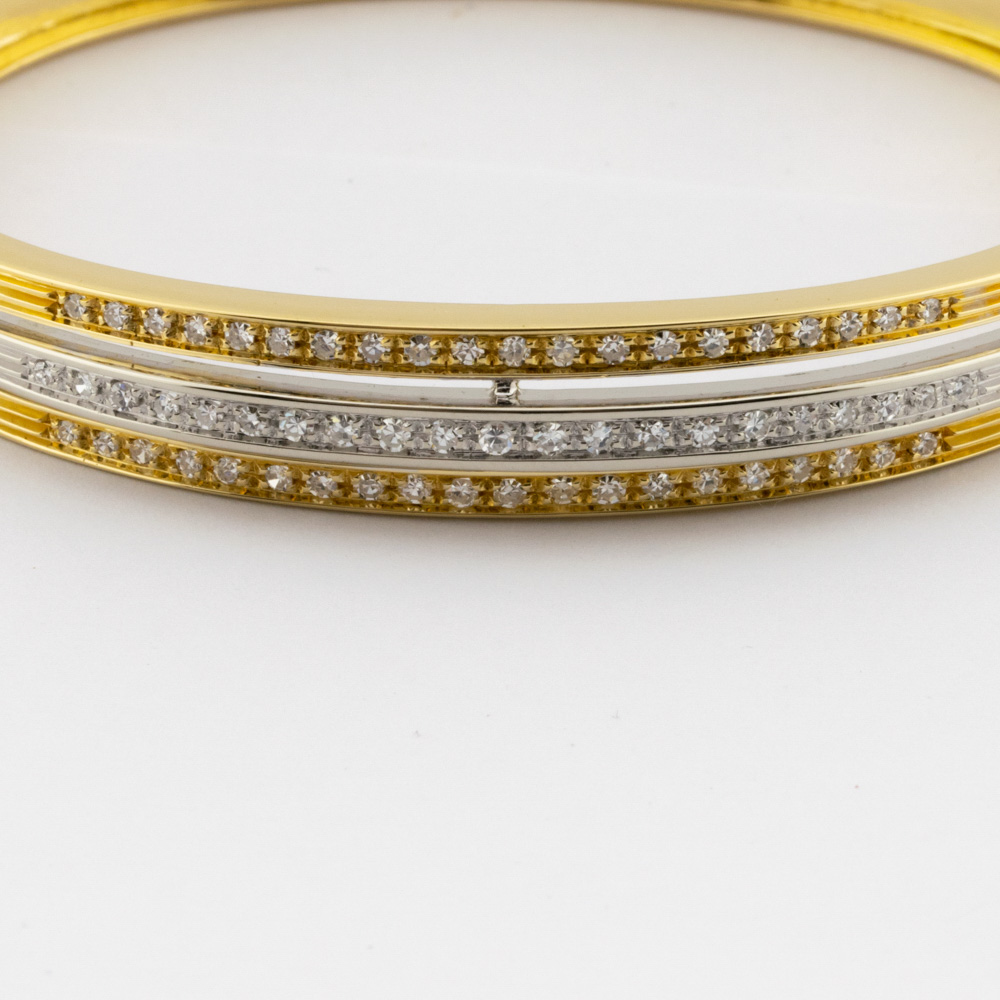 Armreif aus 750 Gelb- und Weißgold mit Diamant, nachhaltiger second hand Schmuck perfekt aufgearbeitet