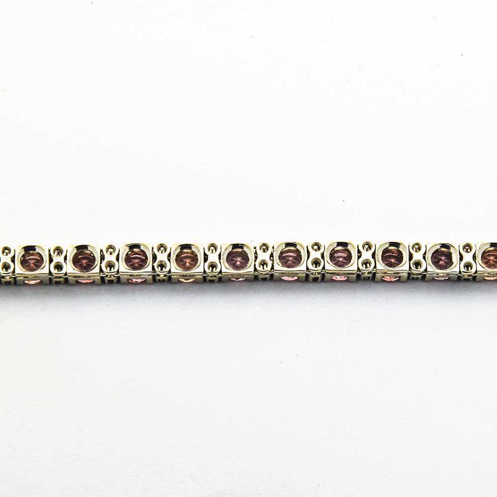Rivièrearmband aus 750 Weißgold mit Granat und Diamant, nachhaltiger second hand Schmuck perfekt aufgearbeitet