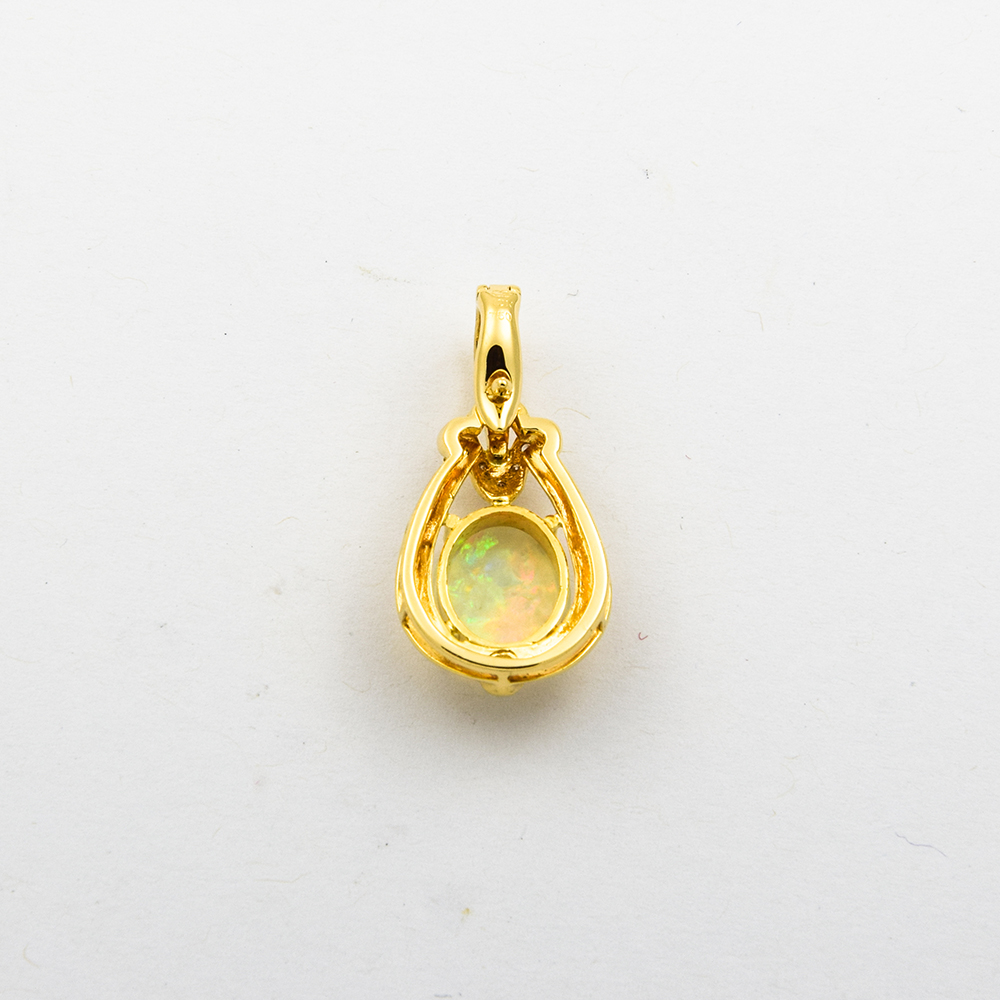 An-/Einhänger aus 750 Gelbgold mit Opal und Brillant, nachhaltiger second hand Schmuck perfekt aufgearbeitet