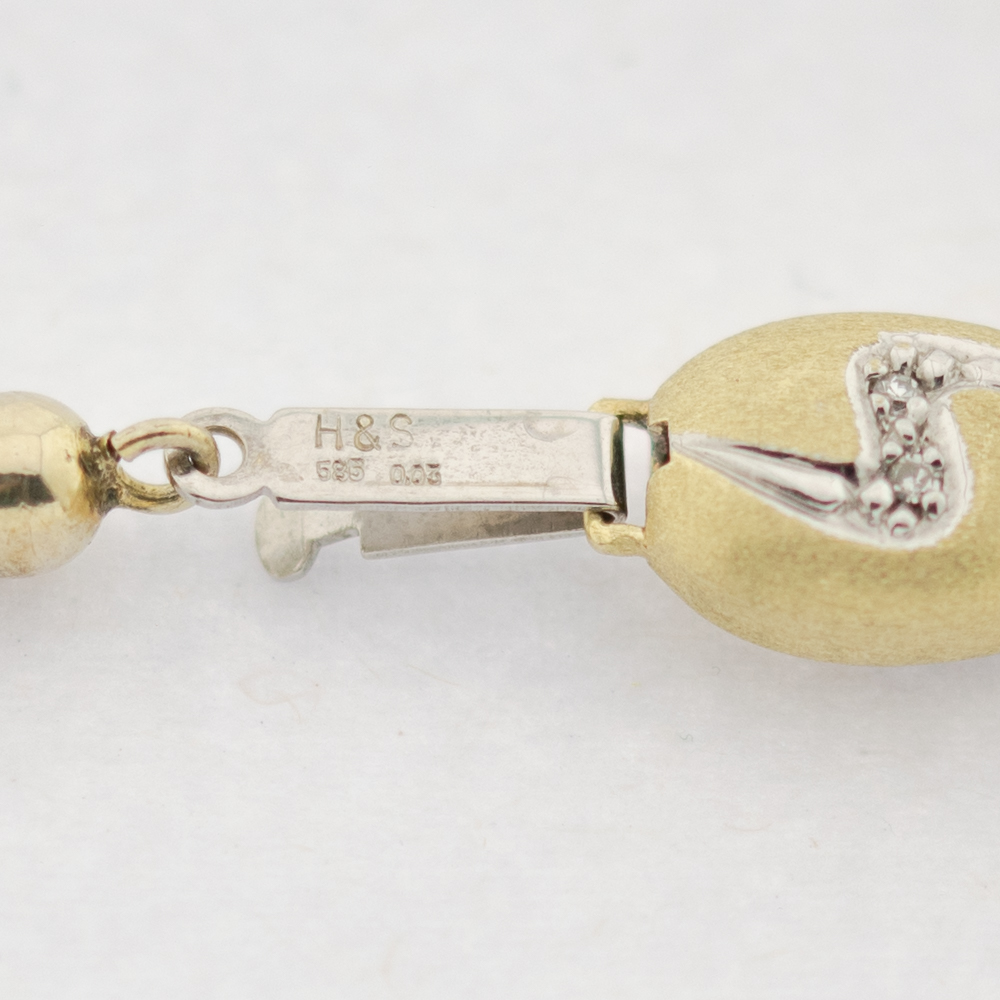 Perlenkette mit Granat und Schließe aus Gelb- und Weißgold mit Diamant, nachhaltiger second hand Schmuck perfekt aufgearbeitet