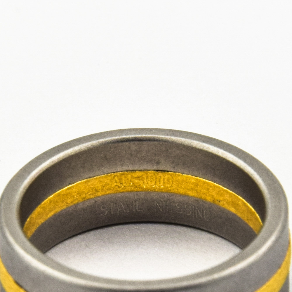 Niessing Ring Fusion aus Edelstahl/Gold,neuwertig,  nachhaltiger second hand Schmuck perfekt aufgearbeitet