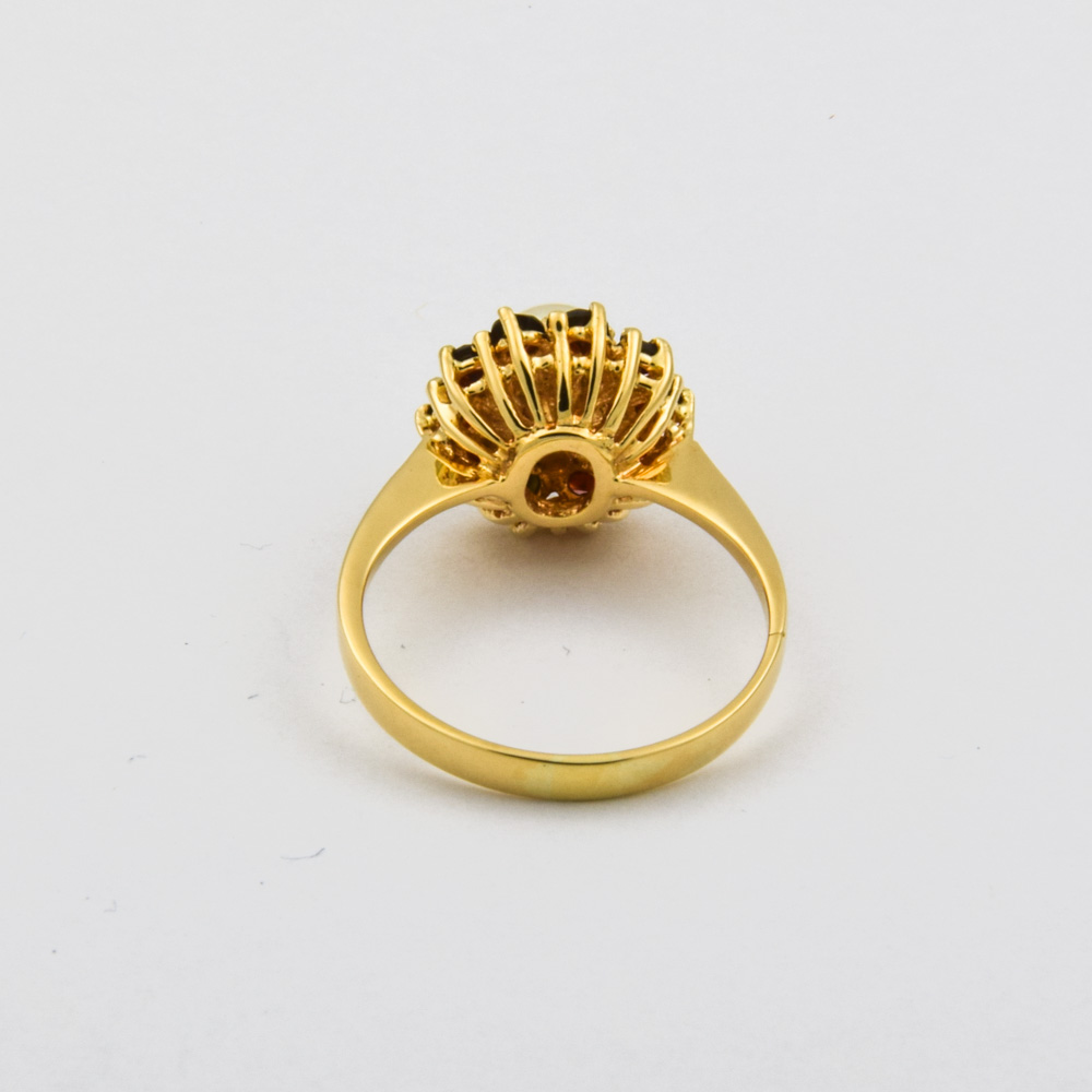 Ring aus 585 Gelbgold mit Perle und Granat, nachhaltiger second hand Schmuck perfekt aufgearbeitet