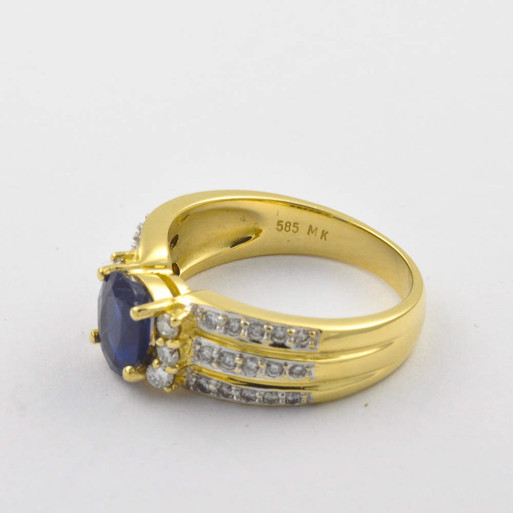 Saphirring aus 585 Gelb- und Weißgold mit Brillant und Diamant, nachhaltiger second hand Schmuck perfekt aufgearbeitet