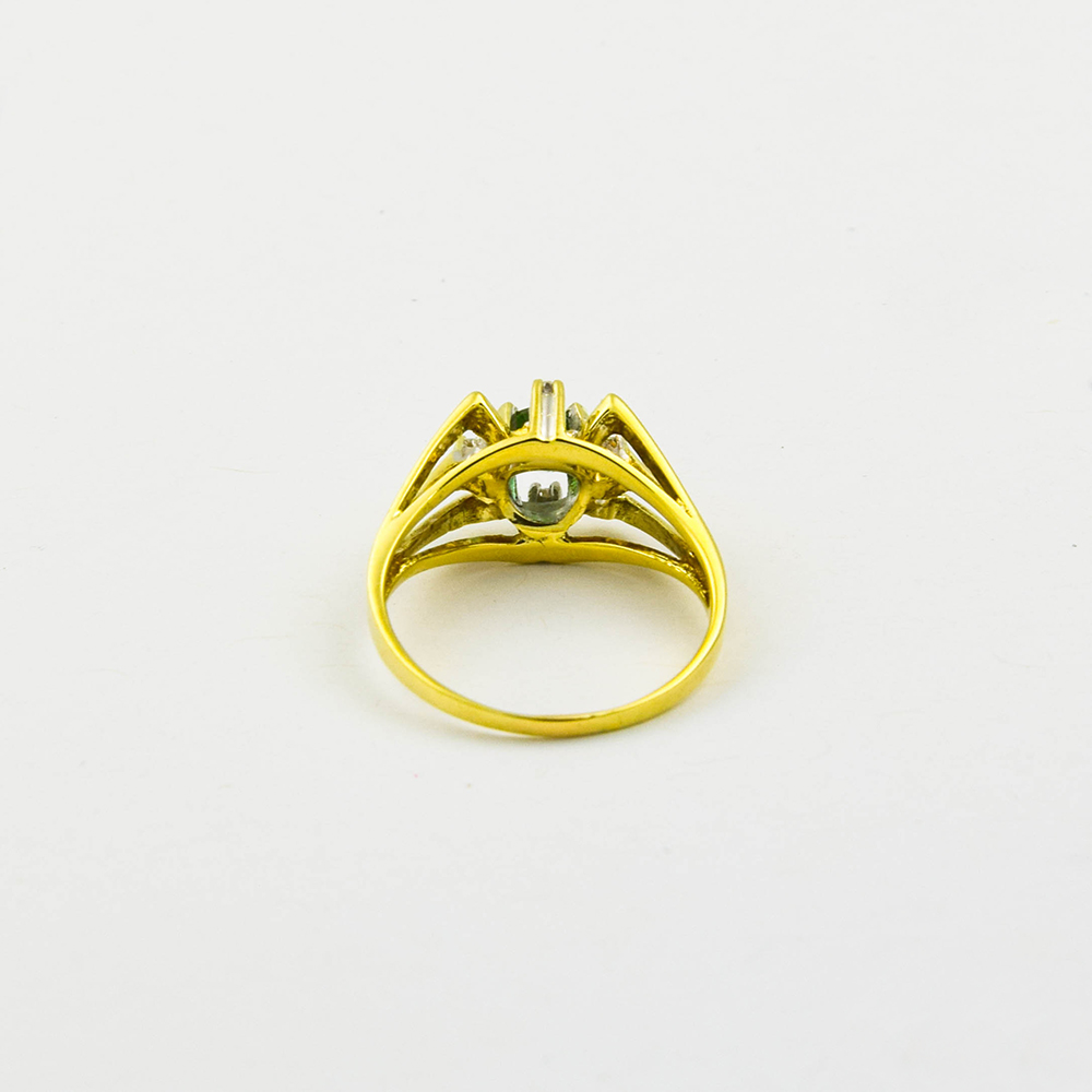 Ring aus 585 Gelb- und Weißgold mit Turmalin und Diamant, nachhaltiger second hand Schmuck perfekt aufgearbeitet