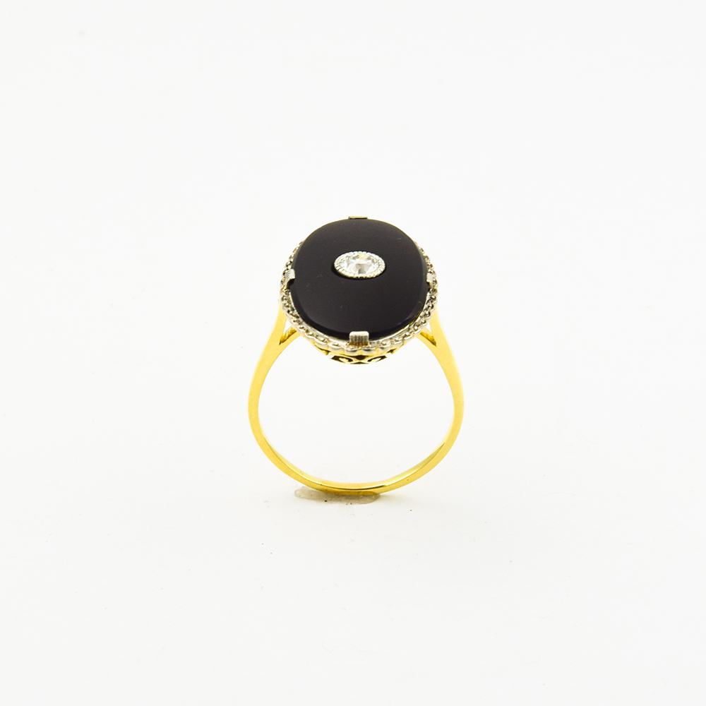 Ring aus 585 Gelb- und Weißgold mit Onyx und Diamant, nachhaltiger second hand Schmuck perfekt aufgearbeitet