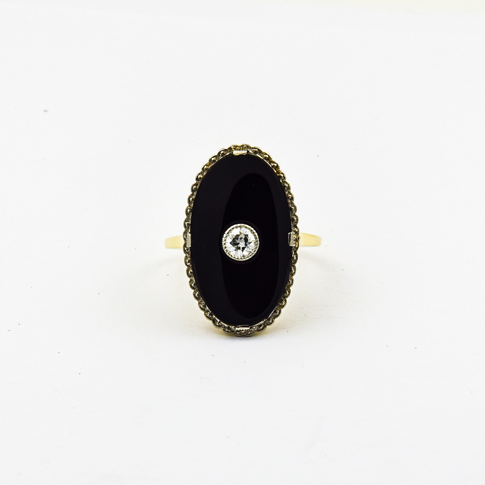 Ring aus 585 Gelb- und Weißgold mit Onyx und Diamant, nachhaltiger second hand Schmuck perfekt aufgearbeitet