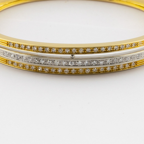Armreif aus 750 Gelb- und Weißgold mit Diamant, nachhaltiger second hand Schmuck perfekt aufgearbeitet