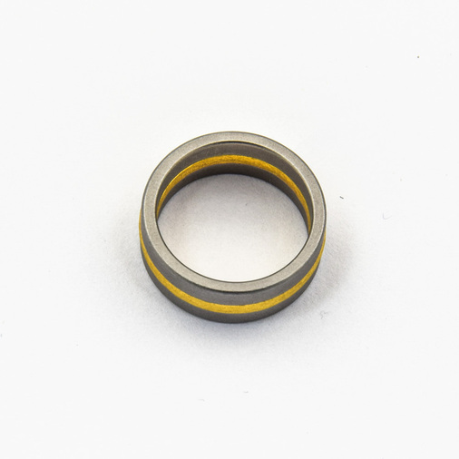 Niessing Ring Fusion aus Edelstahl/Gold,neuwertig,  nachhaltiger second hand Schmuck perfekt aufgearbeitet