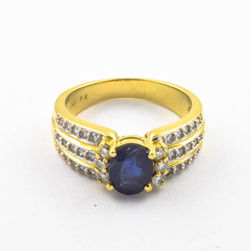 Ring aus 585 Gelb- und Weißgold mit Saphir, Brillant und Diamant, hochwertiger second hand Schmuck perfekt aufgearbeitet