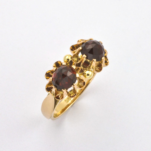 Ring aus 585 Rotgold mit Granat, hochwertiger second hand Schmuck perfekt aufgearbeitet